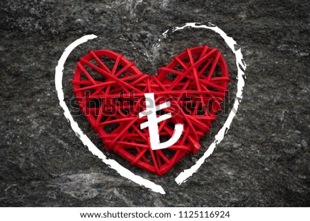 Love of money. Turkish lira sign on a red heart. Love theme