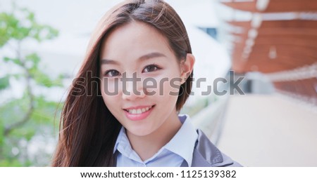 business woman look you and smile happily