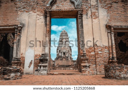 Historic ruins of ancient capital city of Thailand with temples during bright sunny day, Ayutthaya, Thailand