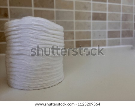 Off centre Cotton pads in bathroom