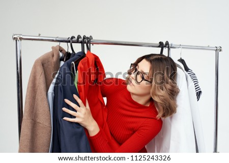woman hanging out things                     
