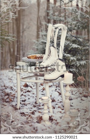 Old white chair, vintage ice skates and homemade cake.