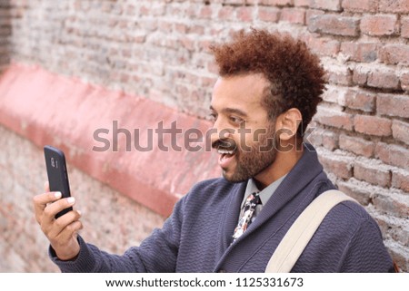 Hip entrepreneur taking a selfie 