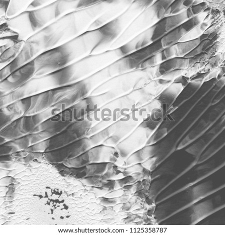 Silver marble ink paper textures on white background. Chaotic abstract organic design.