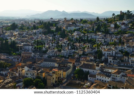 View of Albaicín, Granada, Spain. Albaicín is a district known for its Moorish architecture from the Muslim rule over the land. Popular with the tourists, since 1984 part of UNESCO. Photo: July 2014