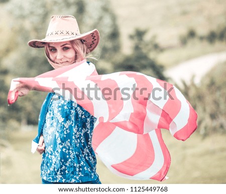 Young woman with american flag ,4th of july