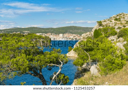 Channel of St Anthony, Sibenik, Croatia. Beautiful sunny day in Dalmatia, Nice outdoors and landscape photo of warm summer season at Adriatic Sea. Calm, peaceful and happy image.