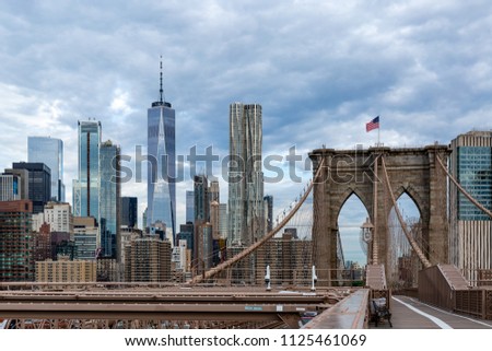 Brooklyn Bridge with building in Lower Manhattan at early morning in New York City