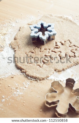 Baking Christmas snowflakes cookies
