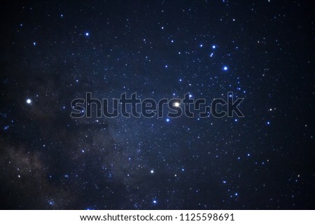 milky way galaxy and space dust in the universe, Long exposure photograph, with grain. Royalty-Free Stock Photo #1125598691