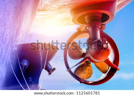 Big propeller closeup image in shipyard waiting docking and sailing after Repair completed on cargo ship forward  background 