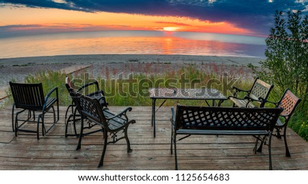 Coastal landscape at colorful dawn, sandy beach of the Baltic Sea. Image filterd for inspiration of fantastic dusky appearance