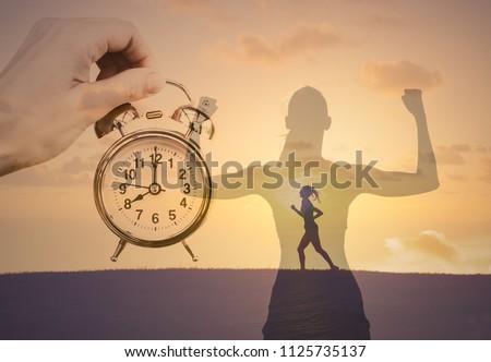 Female motivation. Early morning, running workout and fitness. Getting fit, exercise, healthy lifestyle concept.  Royalty-Free Stock Photo #1125735137