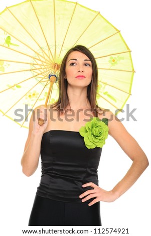 Young women holding a green umbrella isolated