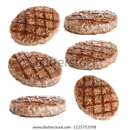  grilled hamburger patty isolated on white Royalty-Free Stock Photo #1125753398