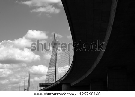The beauty of the Northern Bridge, Friedrich-Ebert-Bridge in Bonn, Germany on a sunny day with single clouds. Black and White, horizontal Close-up.