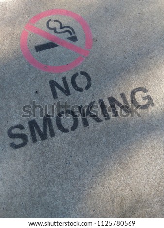concrete warning - no smoking 