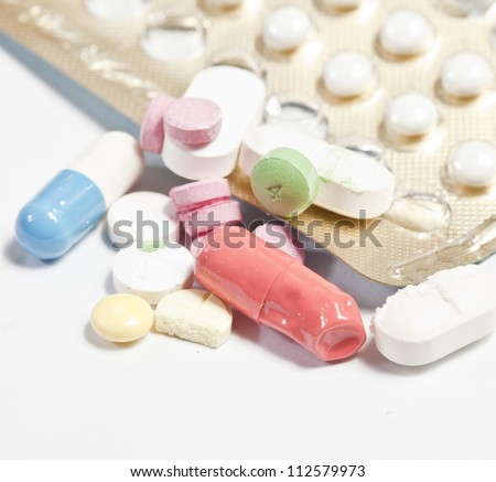 Expired Tablets on white background. Royalty-Free Stock Photo #112579973