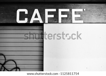 Vintage sign board of a closed cafe in Venice, Italy. Caffe (it.): cafe, coffee