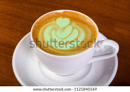 Hot Green cappuccino with cream