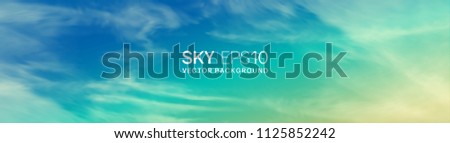 Narrow horizontal vector banner with realistic turquoise-yellow sky and spindrift clouds. The image can be used to design a flyer and postcard. Royalty-Free Stock Photo #1125852242