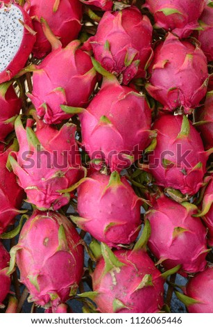 Dragon fruits for sale at rural market in Southern Vietnam.