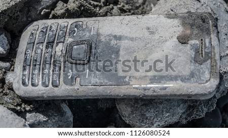 Broken Phone In water mud