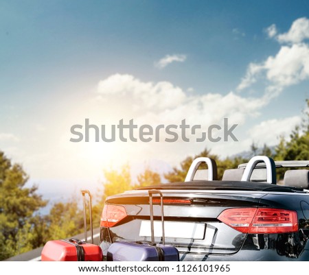 Summer photo of car and free space for your decoration. 