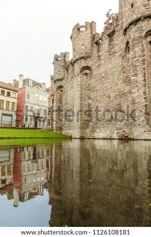 moat with water in front of the castle, Ghent Belgium