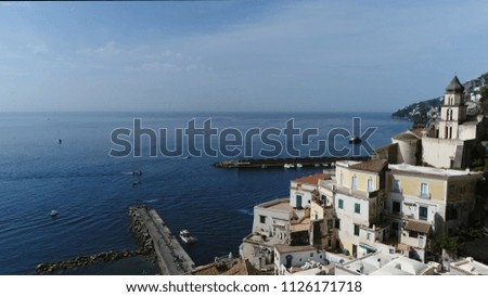 Aerial photo Amalfi looking at Gulf of Salerno it lies at the mouth of deep ravine at foot of Monte Cerreto surrounded by dramatic cliffs and coastal scenery