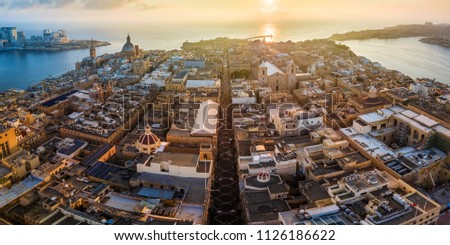 Valletta, Malta - Sunrise and the ancient city of Valletta from above with Triq Ir-Repubblika, the narrow high street of Valletta