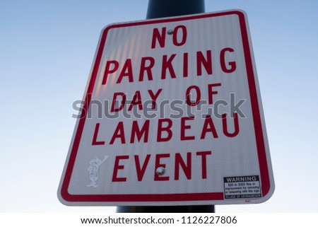 No Parking Day Of Lambeau Event Sign On A Pole Near The Field Royalty-Free Stock Photo #1126227806