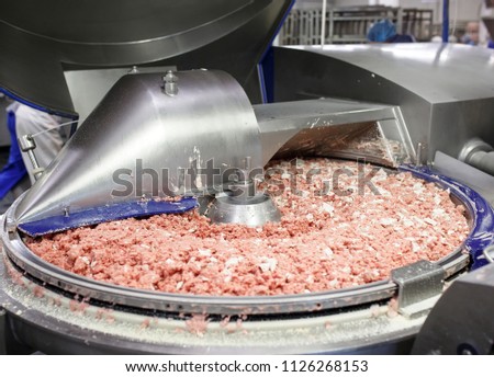 The meat in the Grinder. the meat industry.