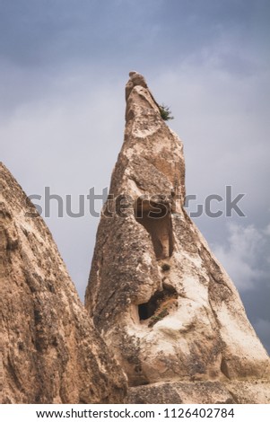 Fairy chimneys, tall, cone-shaped rock formations clustered in Monks Valley, Göreme and elsewhere in Cappadocia.