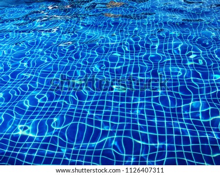 blurry water rippled in swimming pool.