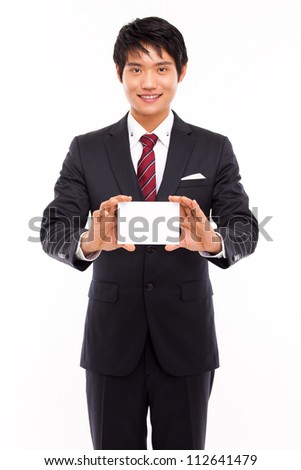 Business man with blank card isolated on white background.