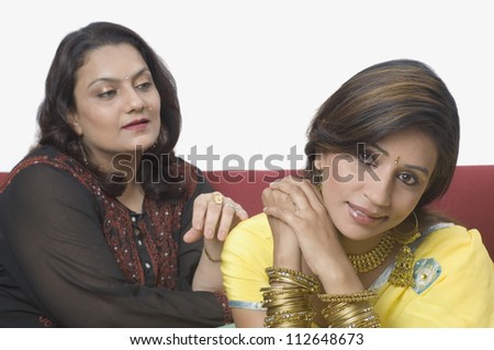 Woman consoling her daughter