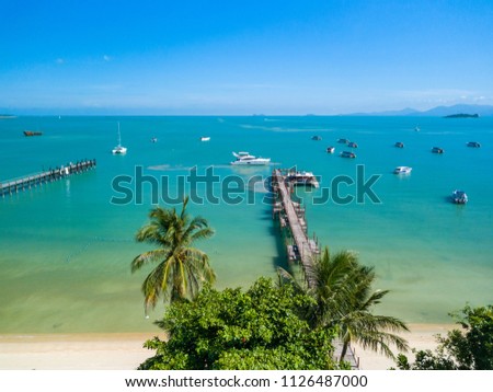 Aerial picture of Bangrak bay and pier looking at the sea, koh samui, Thailand Royalty-Free Stock Photo #1126487000