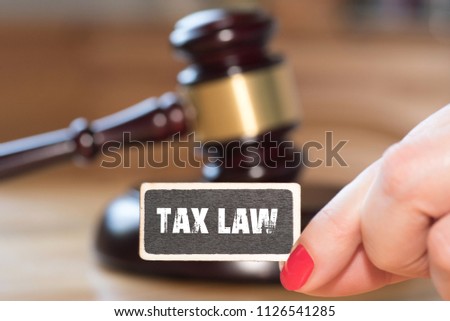 A woman, a gavel and tax law