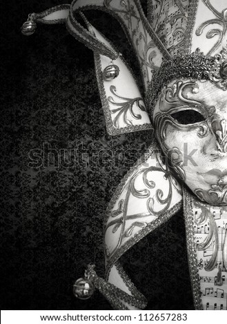 Detail of a beautiful luxury Venetian mask in black and white