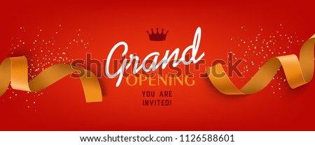 Grand opening red banner design with gold ribbon, crown and confetti. Festive template can be used for invitation cards, flyers, posters. Royalty-Free Stock Photo #1126588601