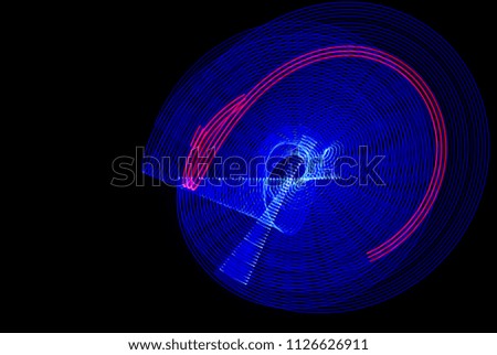 Electric Blue And Red Mixed Light Painting Photography, Parallel Lines, Waves And Curves Against A Black Background