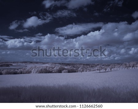  landscape under sky with clouds - the art of our world in the infrared spectrum