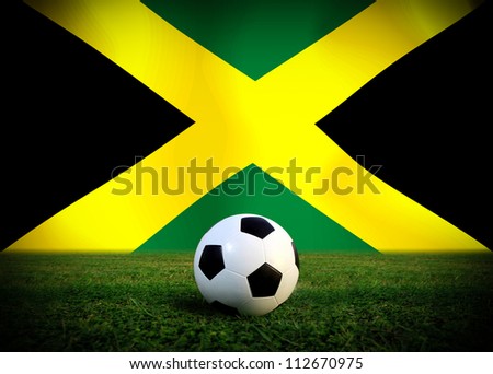  The symbolic power of preparation success victory the classic soccer ball (football) placed on the floor of the lawn.soccer ball sport that is popular around the world. Team unity JAMAICA soccer ball
