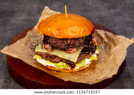 Burger with meat and cheese