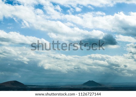 Mountains with clouds and blue sky. Summer.