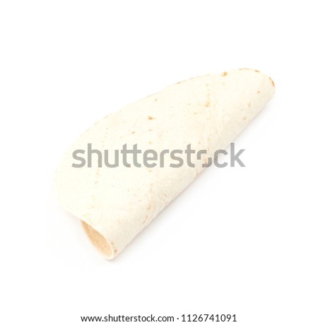 Wheat flour tortilla isolated over the white background