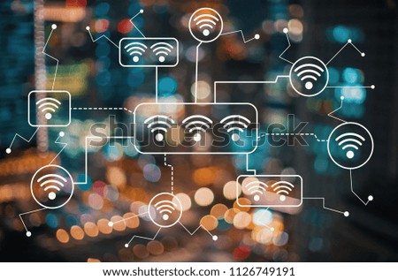 WiFi with blurred city abstract lights background