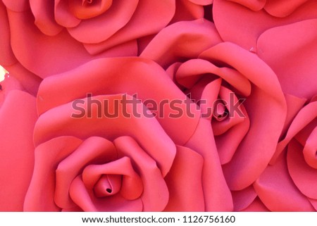 bright red roses from cloth