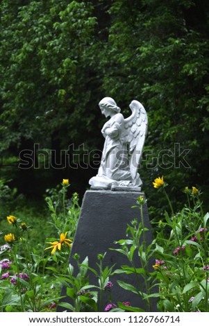 Beautiful sculpture of an angel in the park. Morshyn, Ukraine.